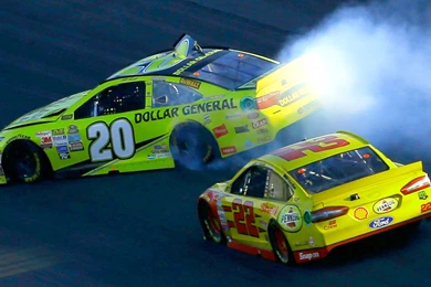 Joey Logano Wins At Kansas; Hard Racing Sends Matt Kenseth Spinning