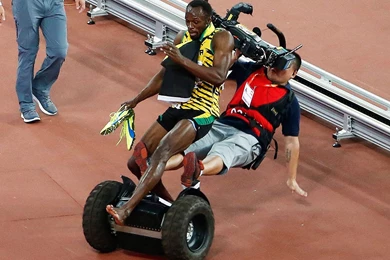 Usain Bolt Gets Run Over By Segway After World Championships Win ...