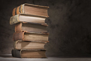 Man Opening Dust Of Old Book In Dark Miscellanea Wallpapers