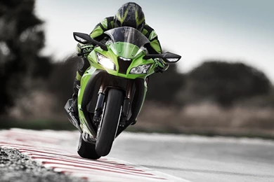 Athlete On A Green Kawasaki Ninja Wallpapers And Images ...