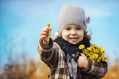 Small Girl With Winter Flowers Wallpapers HD Free Download