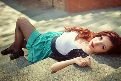 Lying Girl In Fishnet Stockings