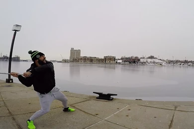 Paul Rabil Throws A Lacrosse Ball Across Baltimore Harbor